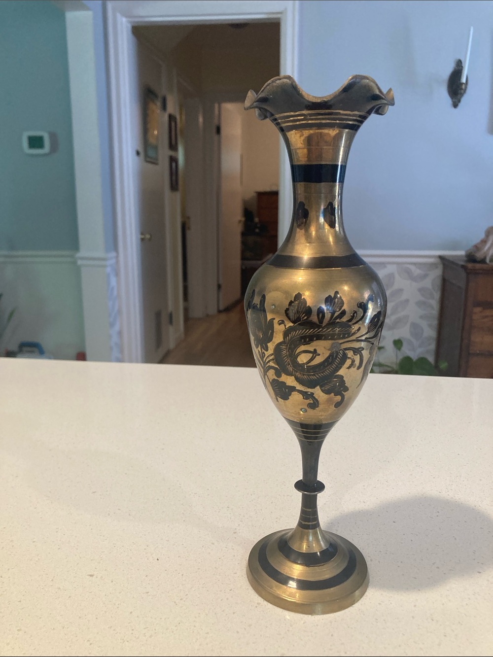 Ornate Brass Vase with Black Floral Motif